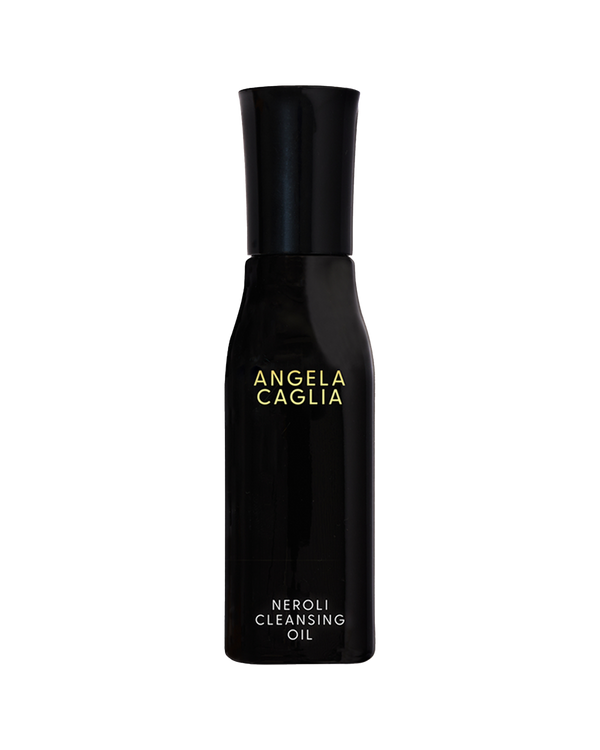 Front view of Neroli Cleansing Oil bottle showcasing glossy black bottle with gold Angela Caglia logo on white background